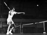 Tennis Player Althea Gibson, Preparing to Hit the Ball While Playing Tennis Reproduction photographique sur papier de qualité par Gordon Parks