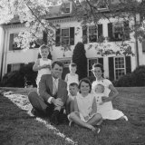 Future Atty. Gen. Robert Kennedy Posing with Wife and Children in Front of Their Hickory Hill Home Photographic Print by Paul Schutzer