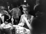 Grace Kelly Sitting at Romanoff's Premium Photographic Print by George Silk