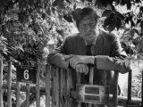 Poet, Wystan H. Auden, Standing Outside Gate of His Home Premium Photographic Print by Harry Redl