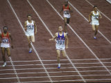 US Athlete Michael Larrabee Winning the 400 Meters at the Summer Olympics Premium Photographic Print by George Silk