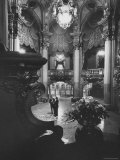 Allan Jay Lerner, and Frederick Loewe in Lobby of the Mark Hellinger Theater Reproduction photographique sur papier de qualité par Gordon Parks
