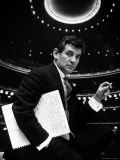 36 Year Old Composer Leonard Bernstein, Holding Musical Score with Lighted Auditorium Behind Him Reproduction photographique sur papier de qualité par Gordon Parks