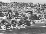 West Germany's Armin Harry, Winner of Men's 100 Meter Dash at Start of Event in Summer Olympics Premium Photographic Print by George Silk