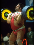 Male Lifting Heavy Weights in Competition at the Olympics Premium Photographic Print by John Dominis