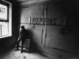 Lower East Side Tenement is Surveyed by Young Resident Hector Davila Before Its Transformation Premium Photographic Print by Arthur Schatz