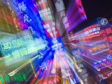 Neon Signs Line Storefronts along Nanjing Road, Shanghai, China Photographic Print by Paul Souders