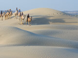 Men Traveling on Camelback Across Sand Dunes, Jaisalmer, Rajasthan, India Photographic Print by Philip Kramer