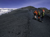 Climbers Heading up a Rocky Trail, Kilimanjaro Kunstdrucke von Michael ...