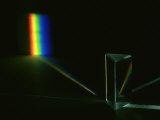 A Prism Refracts Light into Its Spectrum Photographic Print by David M. Dennis