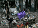 A Pakistani Barber Gives a Haircut and Beard Trim to a Customer Photographic Print