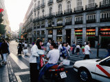 Pedestrians and Traffic, Madrid, Spain Photographic Print by Chester Jonathan