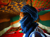 A Man, Wearing his Traditional Tuareg Turban, Stands in His Tent in Koygma Photographic Print