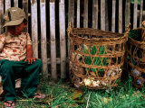 Tired Boy with Baskets, Inle Lake, Myanmar (Burma) Fotografisk tryk af Anthony Plummer