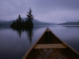 A Canoe Ride on a Cloudy Morning on a Quite Lake Photographie par Taylor S. Kennedy