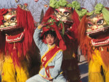 Girl Playing Lion Dance for Chinese New Year, Beijing, China Photographic Print by Keren Su
