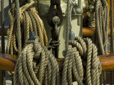 Coiled Ropes Hanging on an Old Wooden Ship Lámina fotográfica por Todd Gipstein
