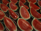 Watermelon Slices Sold at a Market Photographic Print