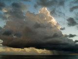 Storm Cloud Drifting Over the Caribbean Sea Photographic Print by Todd Gipstein