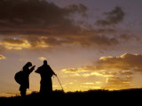 Tibetan Pilgrims on the High Plateau at Dusk, Tibet Photographic Print by Keren Su