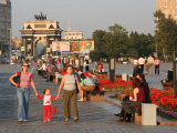 People in Victory Park with Triumphal Arch in Distance, Moscow, Russia Photographic Print by Jonathan Smith