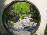 Zig Zag Stone Bridge and Willow Trees Through Moon Gate, Chinese garden, China Photographic Print by Keren Su