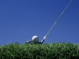Golf Club Lined Up with Golf Ball on Tee Photographic Print by Mitch Diamond