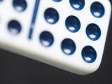 Black and White Domino Against Black Background Photographic Print