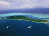 Two Cruise Ships Moored in Bora Bora as Seen from a Helicopter Photographie par Todd Gipstein