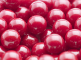 Close-up of a Pile of Red Gumballs Photographic Print