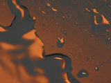 Close-up of Illuminated Orange Water Droplets and a Puddle on a Shiny Surface Photographic Print