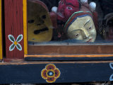 Ceremonial Mask in Shop Window, Paro, Bhutan Photographic Print by Bob Winsett