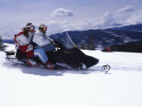 Couple on a Snowmobile Fotografie-Druck