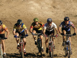 Group of People Riding Bicycles in a Race Photographic Print