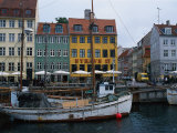 Boats in Canal by Buildings, Copenhagen, Denmark Photographic Print by Harvey Schwartz