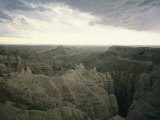 A Storm Moves over Sheep Mountain Table in Badlands National Park Photographic Print by Annie Griffiths Belt