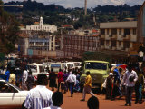 People and Traffic on Busy Street, Kampala, Uganda Photographic Print by Johnson Dennis