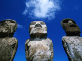 Traditional Moai Carved from Soft Volcanic Rock with Clouds Above, Ahu Tongariki, Chile Photographic Print by Brent Winebrenner