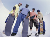Low Angle View of a Group of Young Men Holding Skateboards Photographic Print