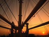Sunset Through the Mast of S.S. Shanghai, China Photographic Print by Dallas Stribley