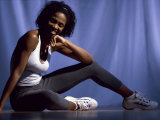 Young Woman Exercising on the Floor Photographic Print