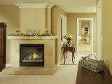 A Fire in the Fireplace and Candles on the Mantle Photographic Print