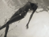 Young Woman Swimming in a Swimming Pool Photographic Print