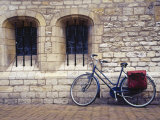 Holland, Goude, Bicycle Parked Beside Church Fotografisk trykk av Jennifer Broadus Holland, Goude, Bicycle Parked Beside Church Fotografisk trykk av Jennifer Broadus