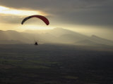 A Botanist Flies over a Field in a Powered Paraglider Photographic Print by Jim Webb