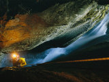 Cave Explorer Climbs Through One of the Madre De Dios Island Caves Photographic Print by Peter Carsten