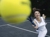 Close-up of a Young Woman Playing Tennis Photographic Print