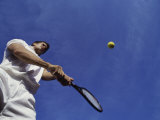 Tennis Player with Blue Sky Photographic Print