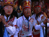 Costumed Dancers at the Fiesta De La Virgen Del Carmen, Pisac, Cuzco, Peru Photographie par Grant Dixon