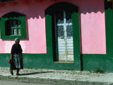 Elderly Woman Walking Past Pink and Green Building, Chiapas, Mexico Photographic Print by Eric Wheater